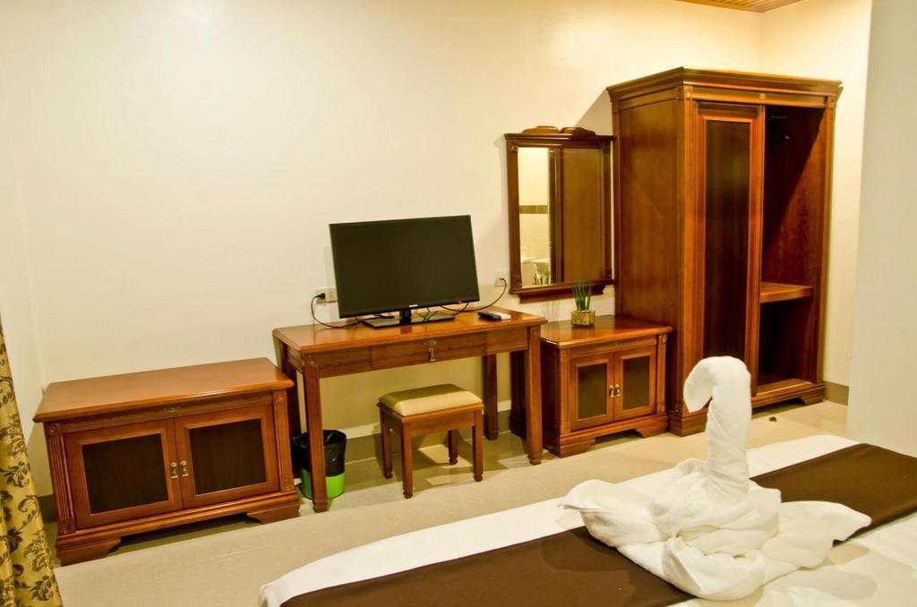 The Premiere Business Hotel Kalibo Habitación foto